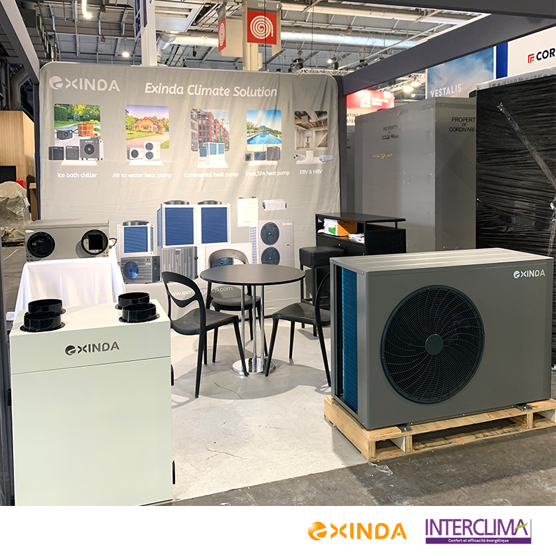 EXINDA air-to-water heat pump and ventilation display at a Paris HVAC exhibition