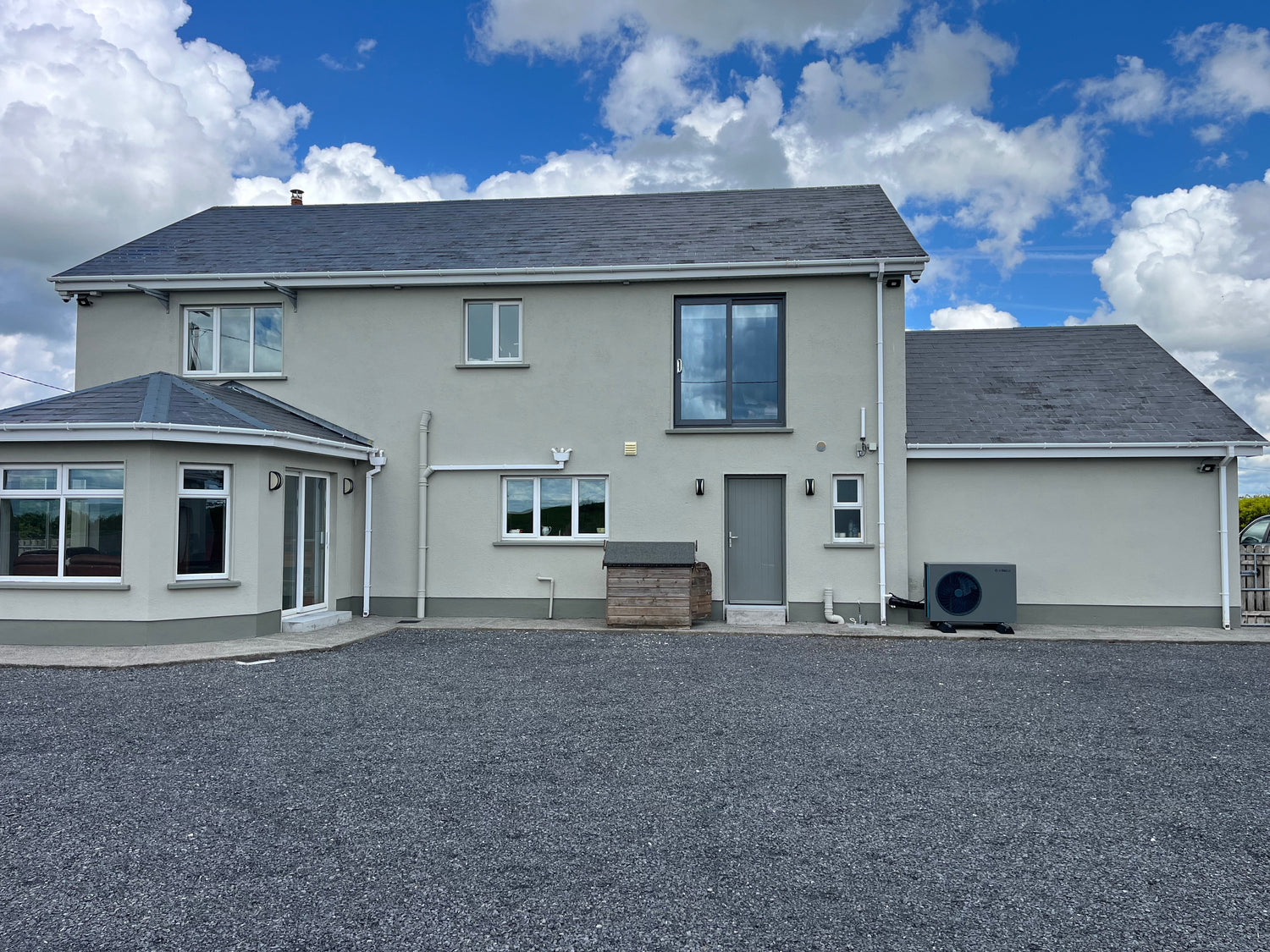 heat pump installation Ireland EXINDA air to water system outdoor unit villa case study